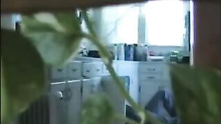 A married couple has an apartment walk and get intimate in the kitchen