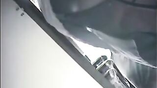 The camera is hiding at the checkout in the shop