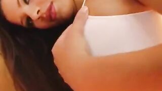 The girl played with her big pussy with dildo close-up