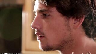 A brunette woman was making a blowjob right in the bedroom on her bed