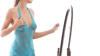 A beautiful body is being caressed in front of the mirror