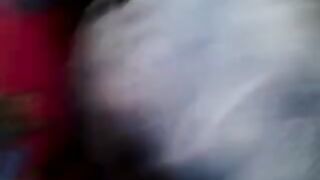 A guy checks the strength of a riser on girls in a bus