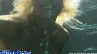 A blowjob scene shot in the pool with a bikini-clad beauty