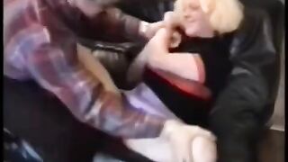 A sexy girl is having fun with a guy on his couch