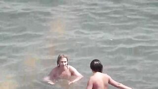 Bunch of beautiful naked girls bathing in the sea