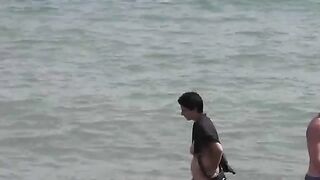 Bunch of beautiful naked girls bathing in the sea