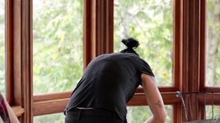 Vietnamese with a strap-on fucks a young girl in the kitchen
