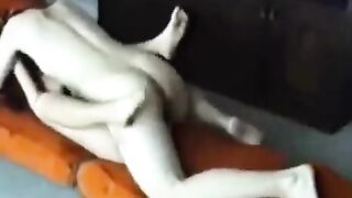 Sex of a young married couple, husband and wife at home