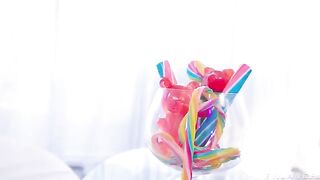 A girl has fun with her new vibrator and latex sex suit