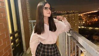 A hot girl is fucking with a guy with a view of the city