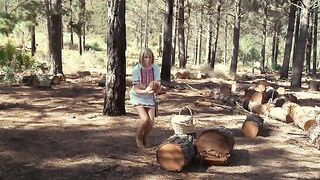 A couple engaged in outdoor sex, using a vibrator for added pleasure