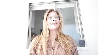 Young blonde gets a huge load of cum on her face after giving a blowjob under the table