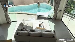 A lonely girl smokes a joint and indulges in solo pleasure by the pool