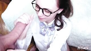 A cute Russian girl with glasses gets her face covered with cum in this hot video