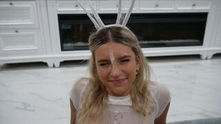 The guy decorated the girl's face with cream and the girl had to lick it off