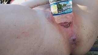 A busty beauty reached the peak of pleasure while indulging outdoors