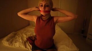 A girl plays a role, captivating with her gaze in an intense scene