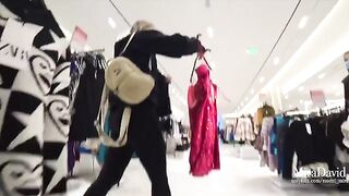Naughty girl caressed a guy’s cock in the fitting room, almost caught