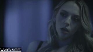 Two girls and a guy in a dark, intense threesome scene